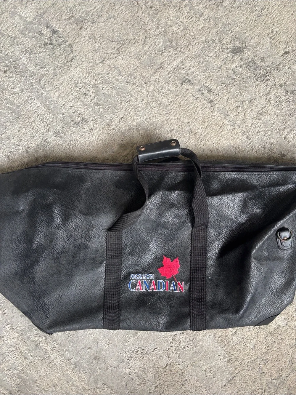 Black Duffel Bag with Red Maple Leaf Accent